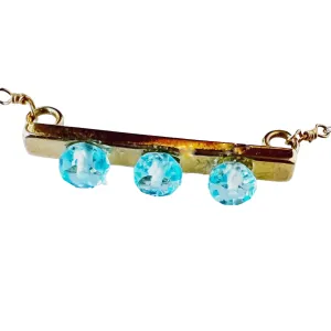 Blue Topaz and Gold Pendant