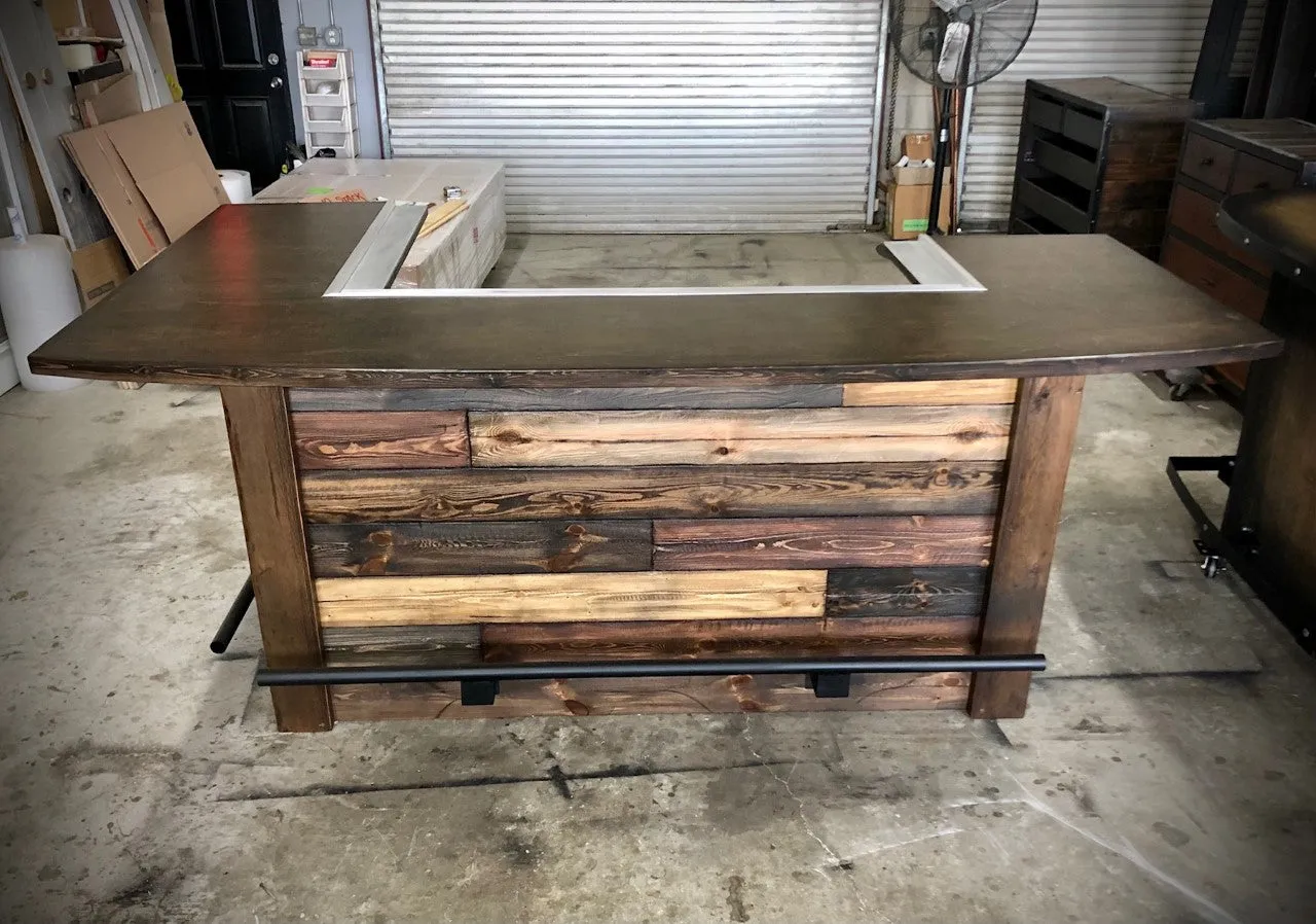 Rustic reclaimed plank goodtimes bar with foot and drink rail