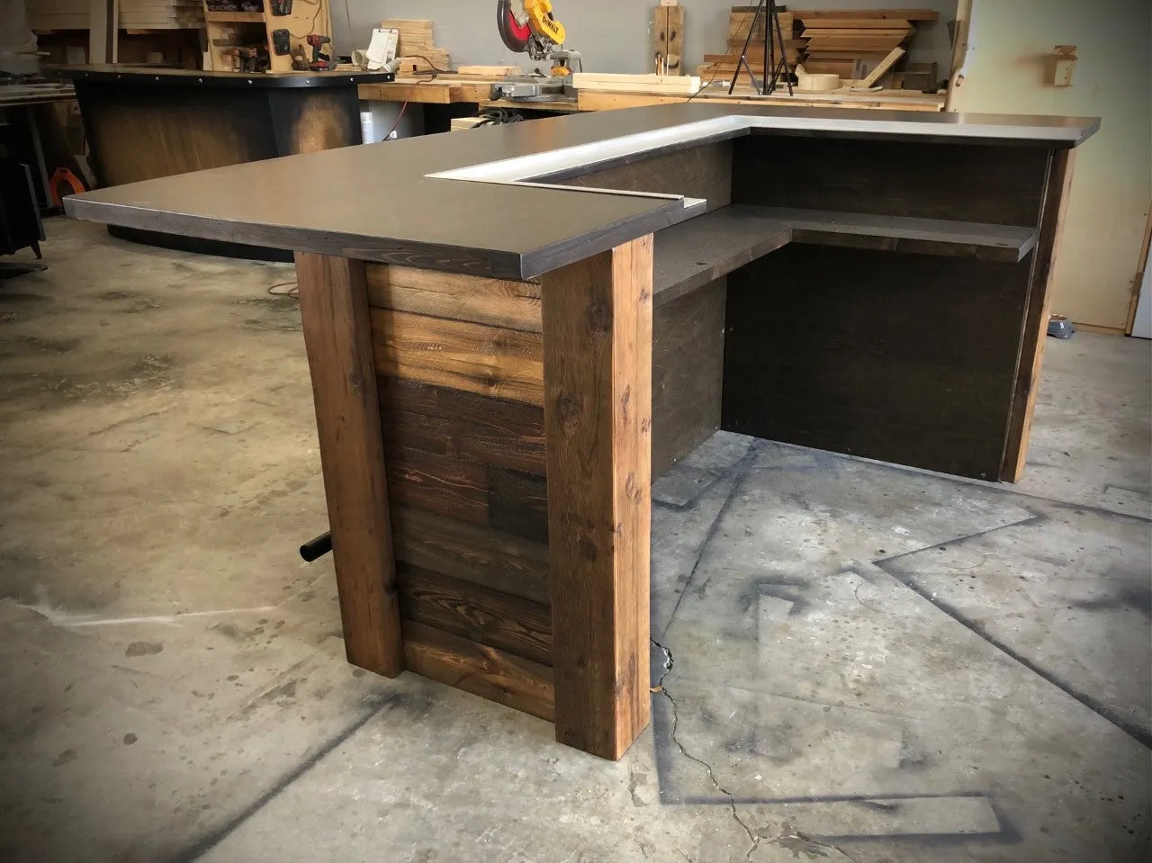 Rustic reclaimed plank goodtimes bar with foot and drink rail